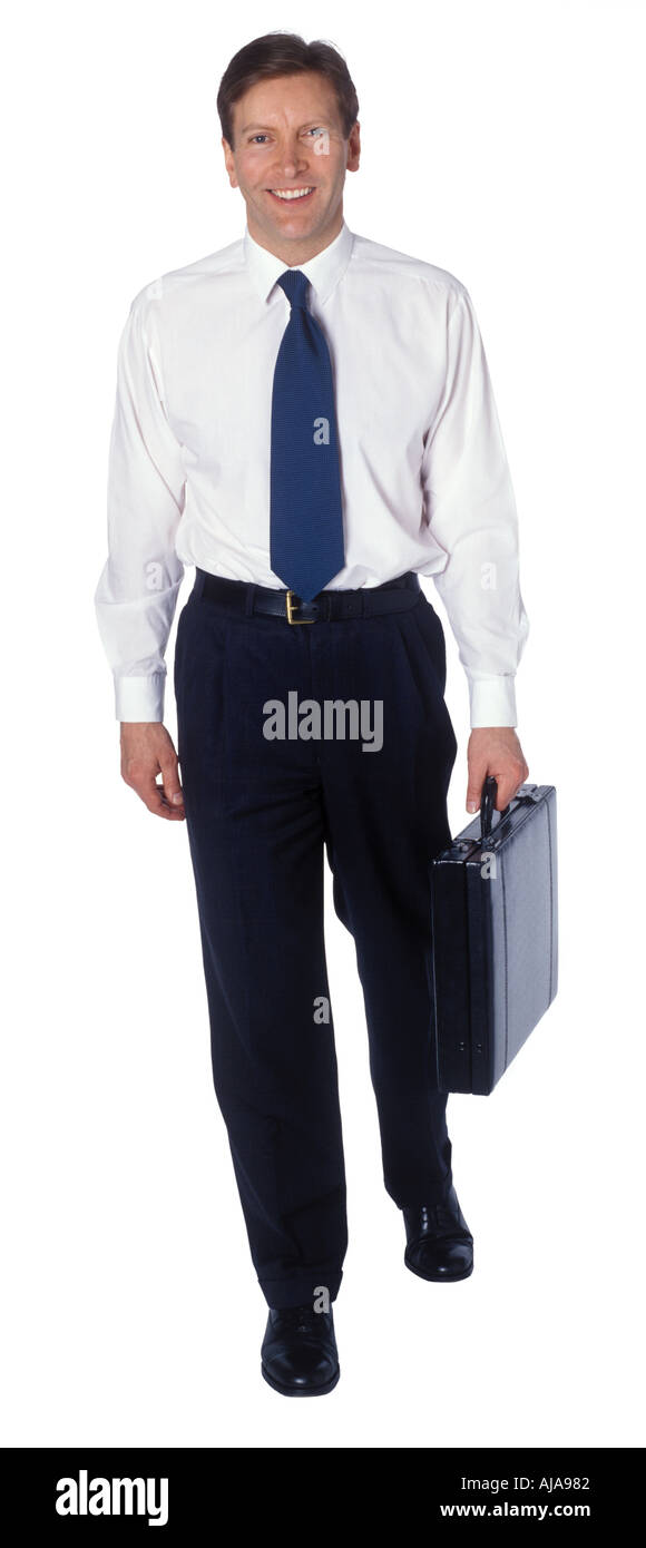 Geschäftsmann mit Aktenkoffer zu Fuß Stockfoto