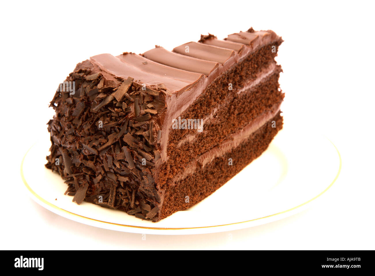 Reiche Schokolade Kuchen auf einem weißen Teller Stockfoto