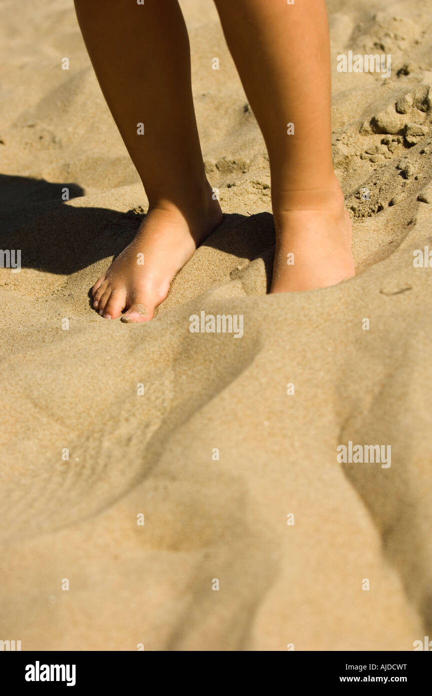 Paar Füße im sand Stockfoto