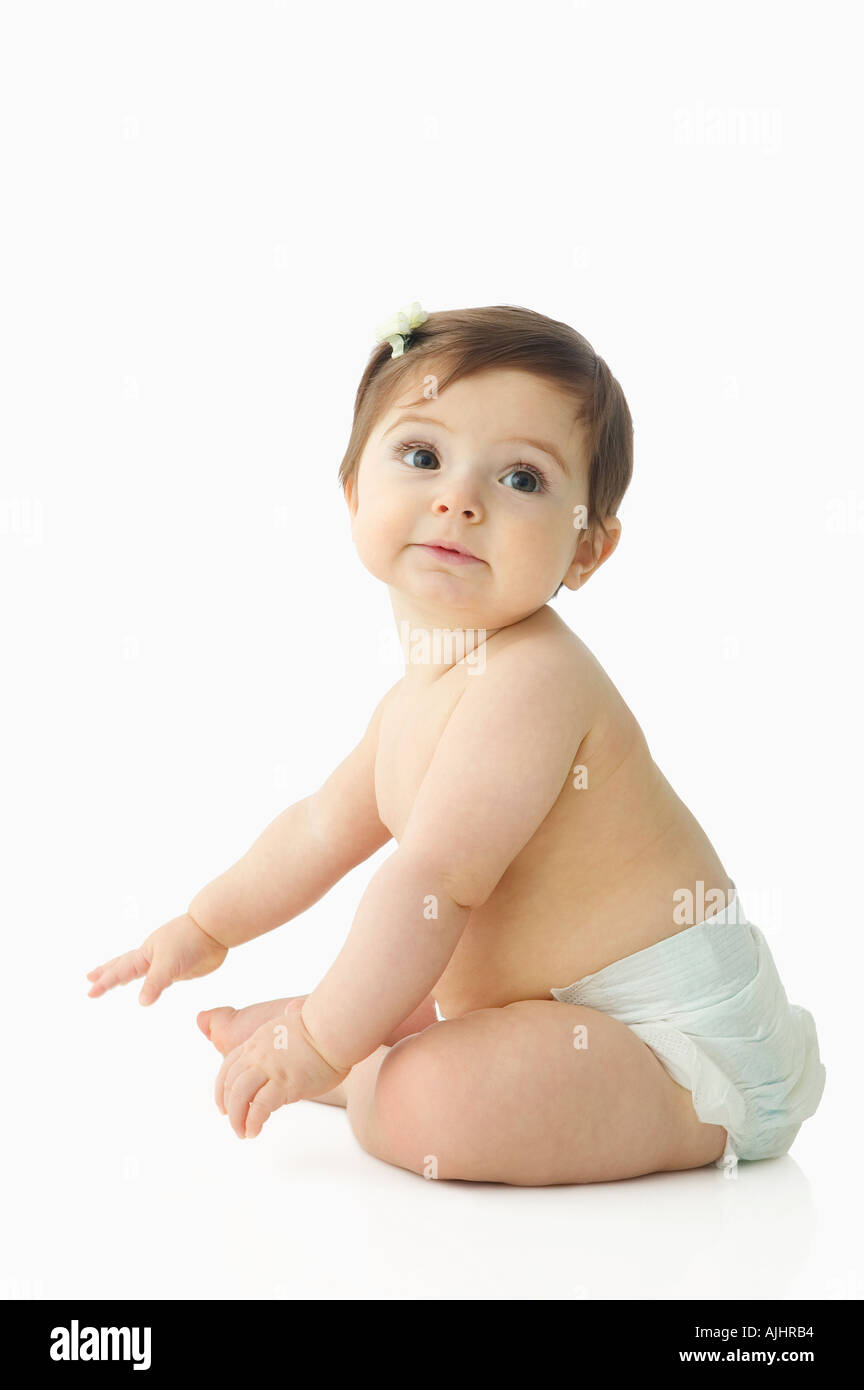 Babymädchen mit Clip im Haar Stockfoto