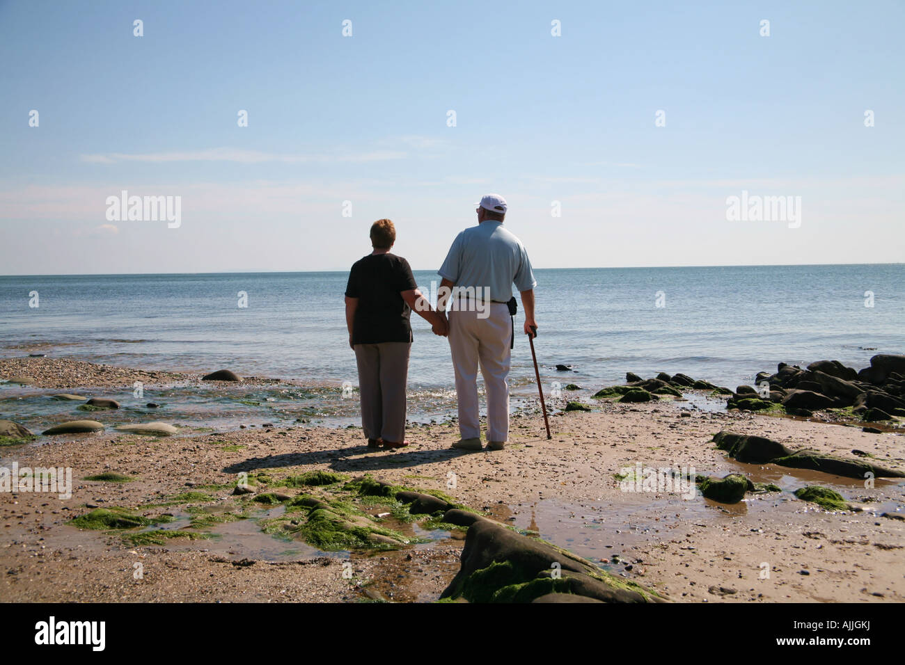 Ehepaar im Ruhestand am Strand Stockfoto