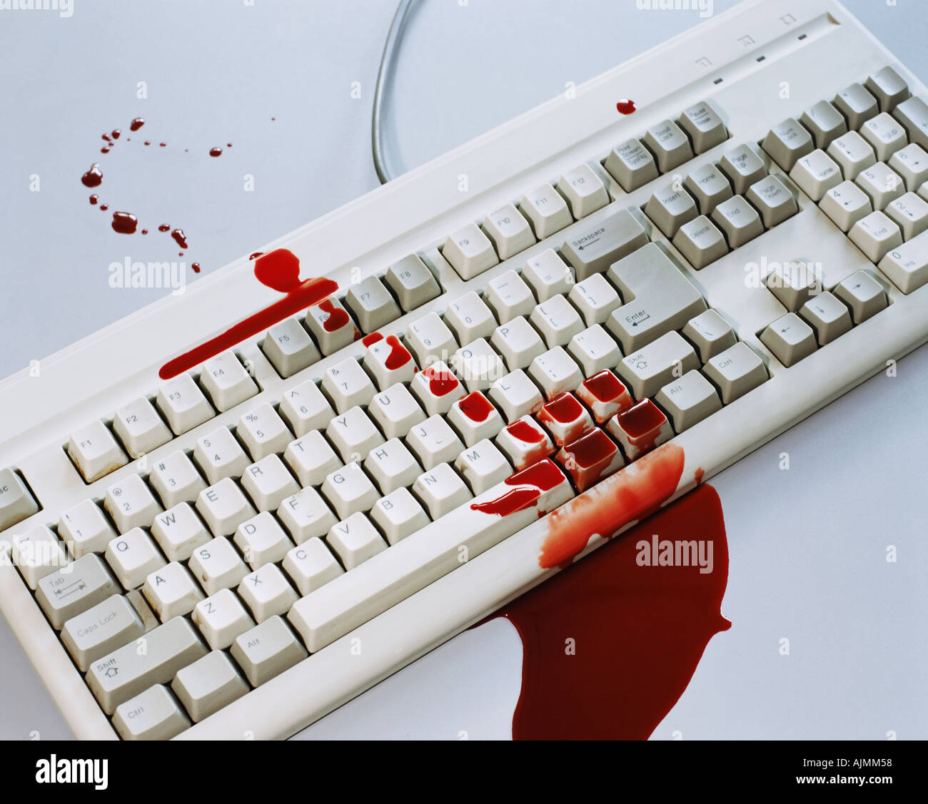 Blut auf einer Computertastatur Stockfoto