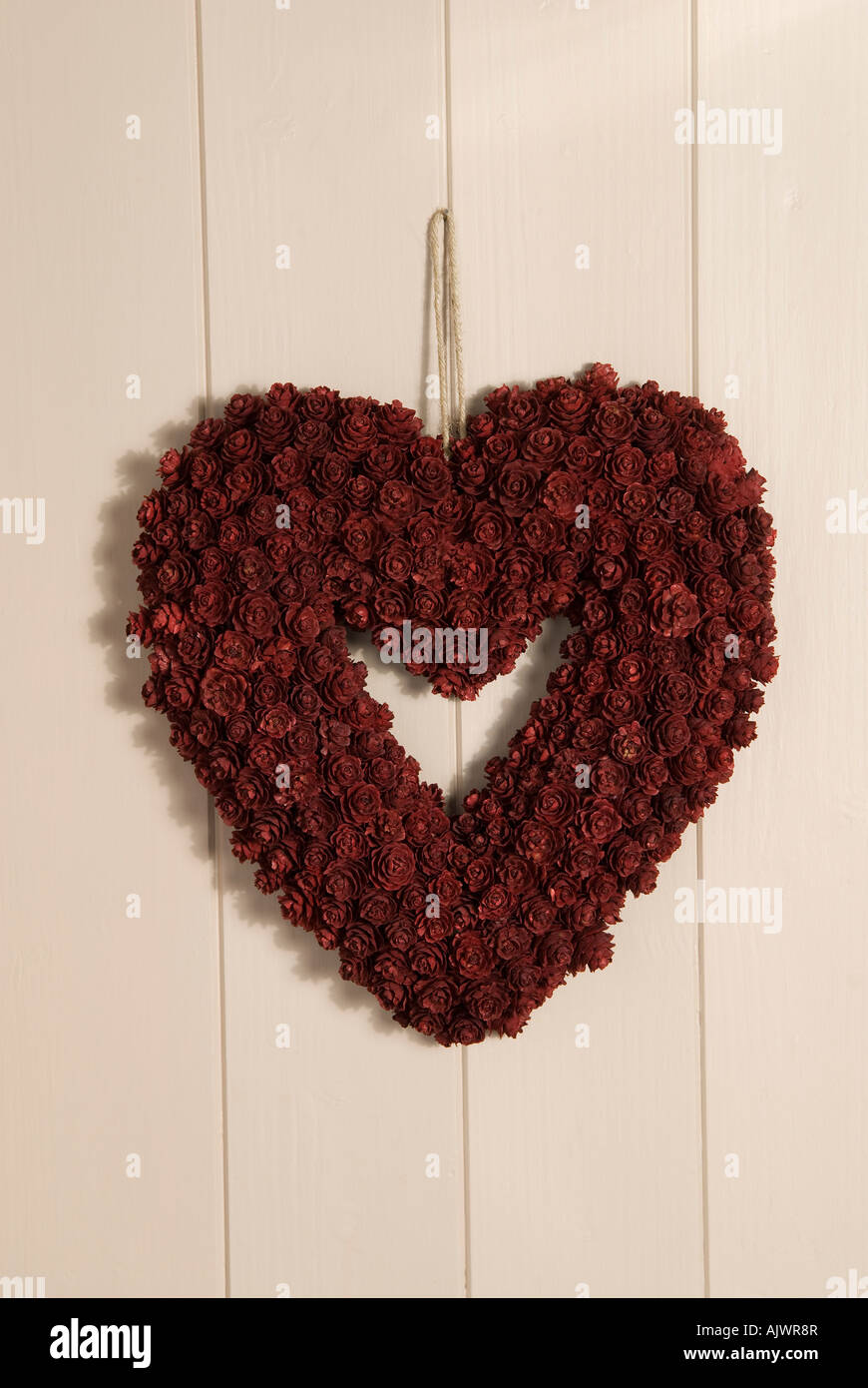 dekorative Rosen auf herzförmigen Dekoration Stockfoto