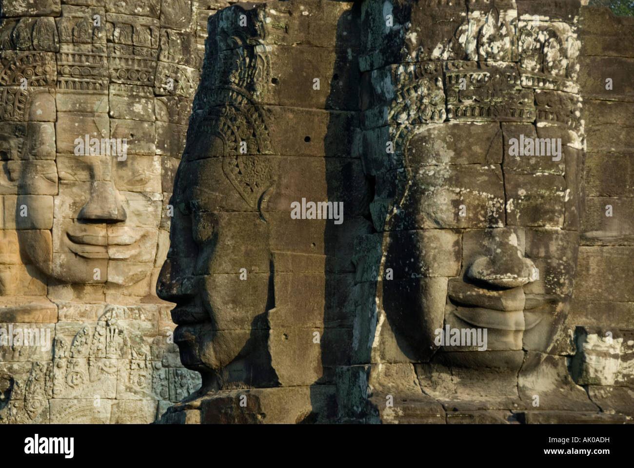 Drei Gesichter der Jayavarman VII in am Nachmittag Licht. Bayon, Angkor Thom, Angkor Wat, Seam Reap, Kambodscha Stockfoto