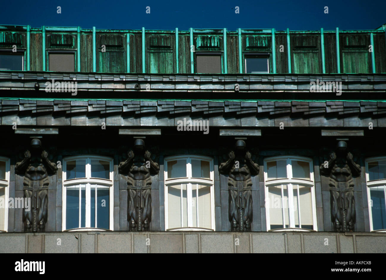 Österreich, Wien i., Brandstätte, Tragende Atlanten bin Jugendstilhaus von Architekt Josef Plecnik. Stockfoto