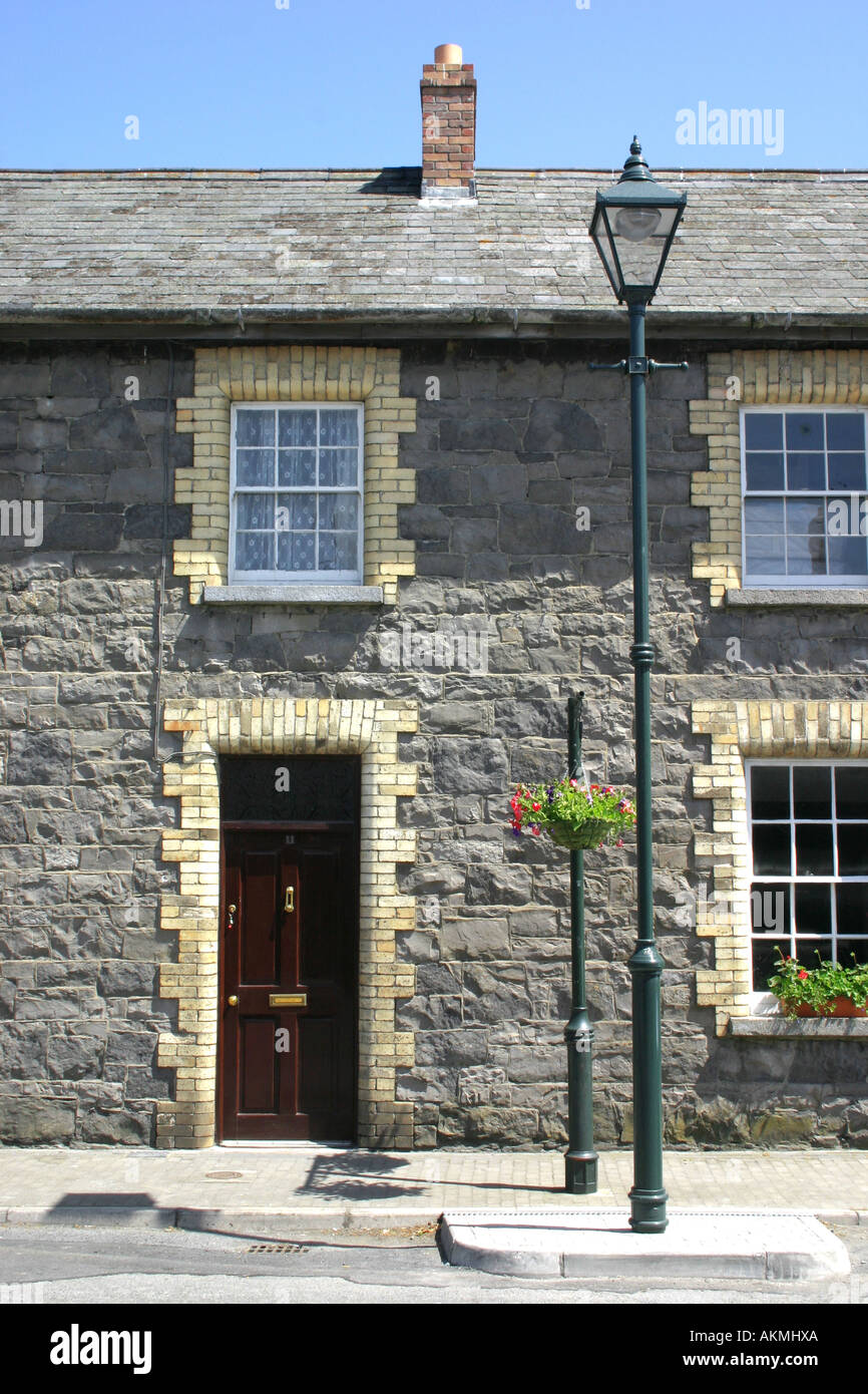 Terrassenförmig angelegten Reihe von viktorianischen Arbeiterhäuser in Greenore, County Louth, Irland Stockfoto