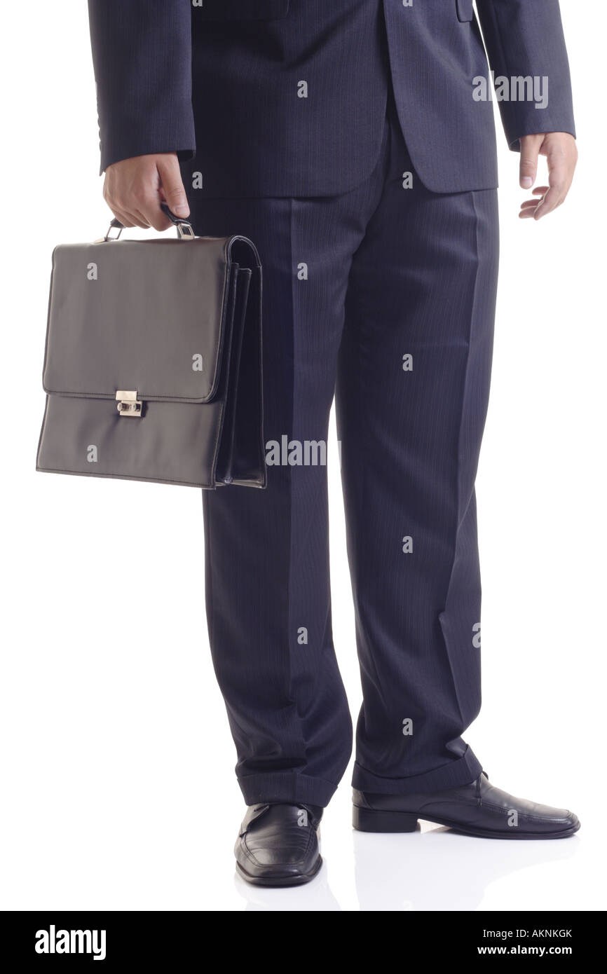 Geschäftsmann mit einem Koffer Stockfoto