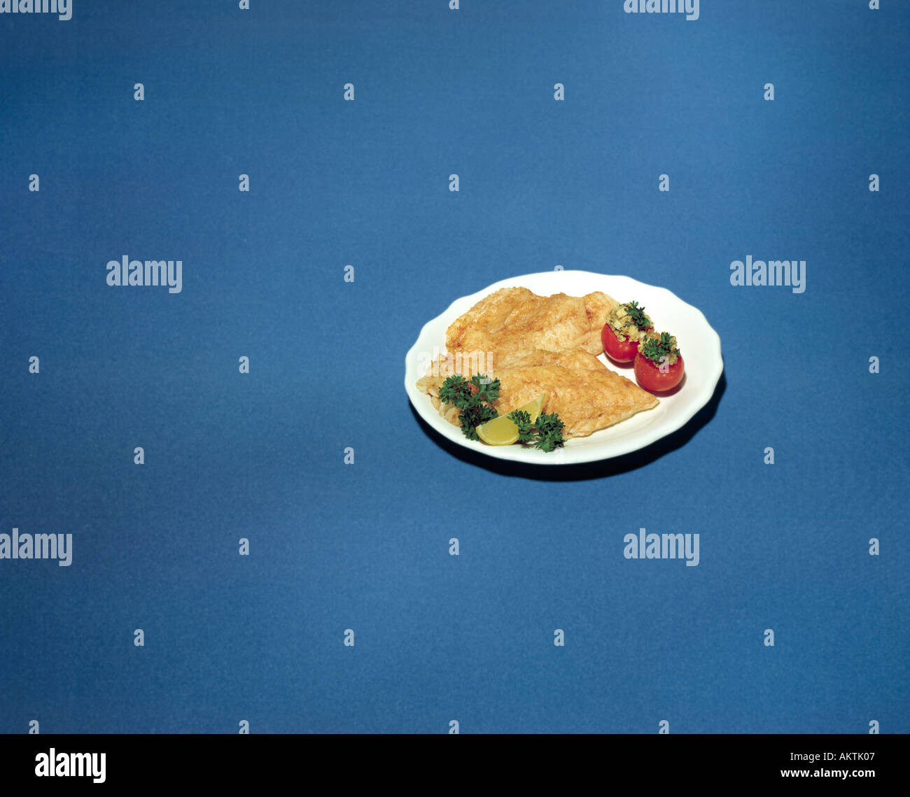 Fischfilet auf weißem Teller Bon Appetit Stockfoto