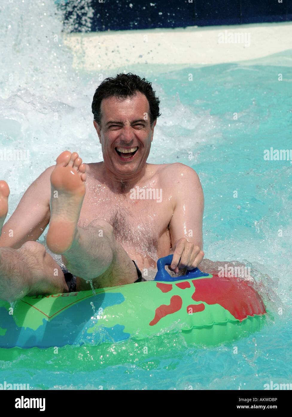 Menschen, die Spaß am Wasserpark Stockfoto