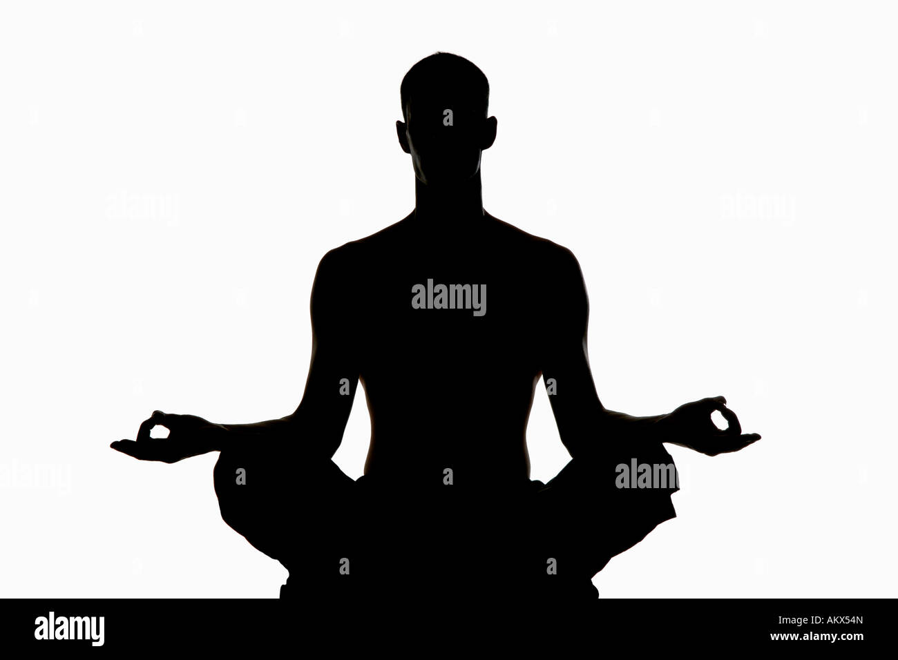 Mann Ausübung Yoga, silhouette Stockfoto