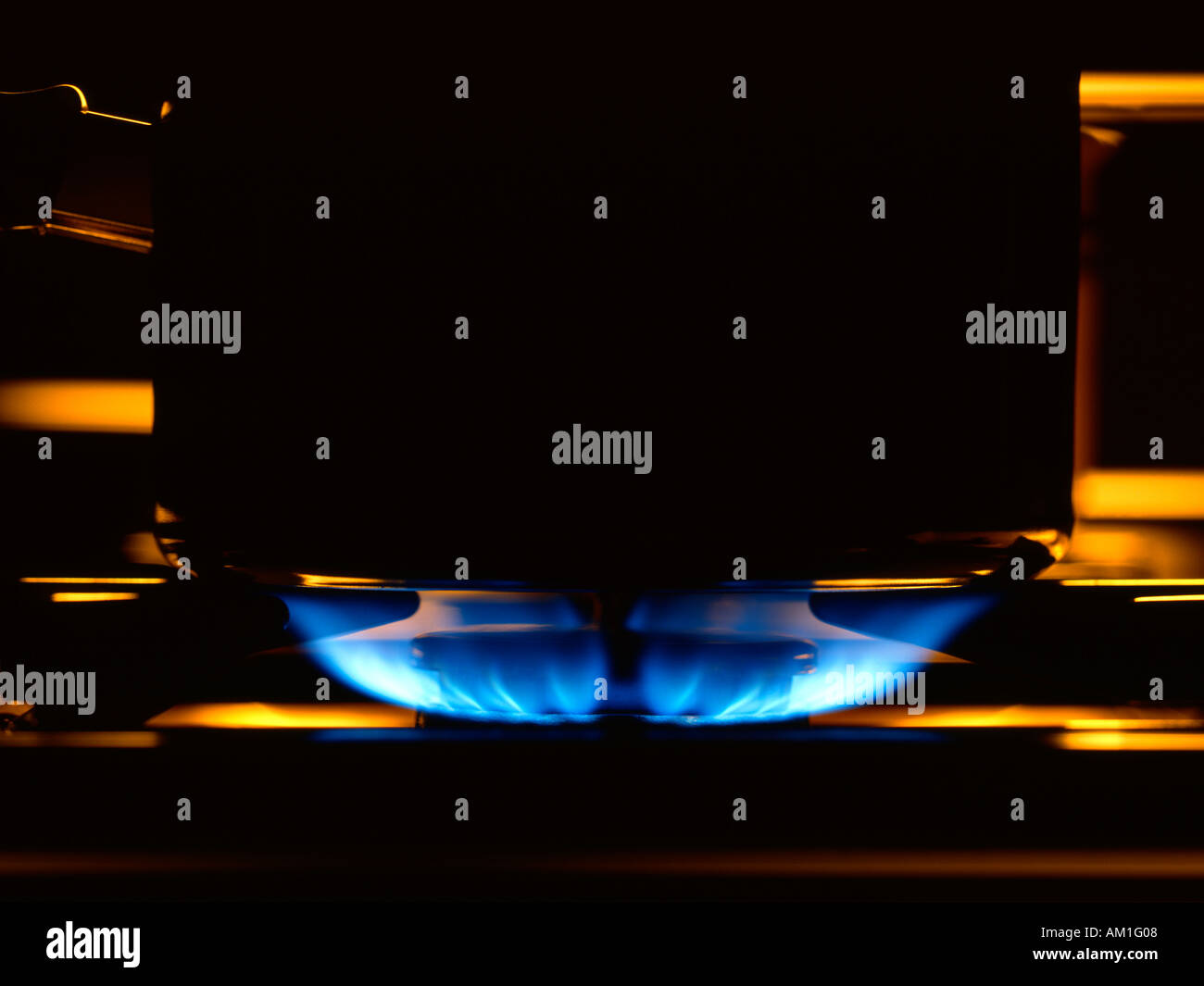 Gasflamme auf einem Herd Kochfeld Stockfoto