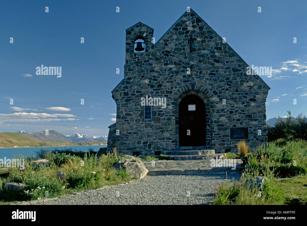 Historische Steinkirche am Ufer des wunderschönen LAKE TEKAPO im Herzen der südlichen Alpen SOUTHLAND NEW ZEALAND Stockfoto