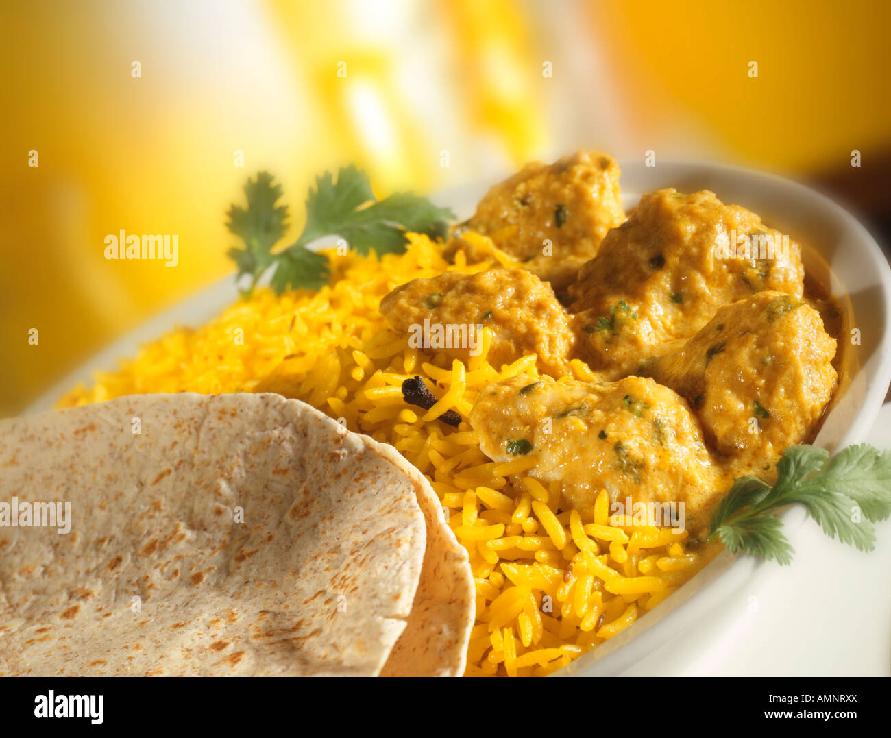 Chicken Korma mit Pilau Reis. Indisches Curry. Stockfoto