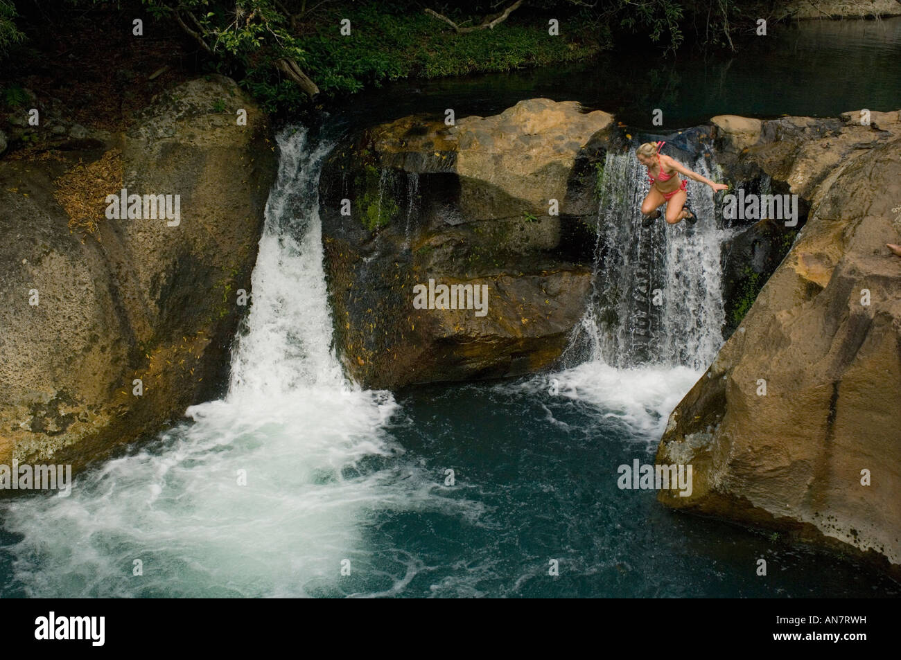 Frau Sprung Las Chorreras fällt, Hacienda Guachipelin, Rincon De La Vieja, COSTA RICA Stockfoto Frau Sprung Las Chorreras fällt, Hacienda Guachipelin, Rincon De La Vieja, COSTA RICA Stockfoto