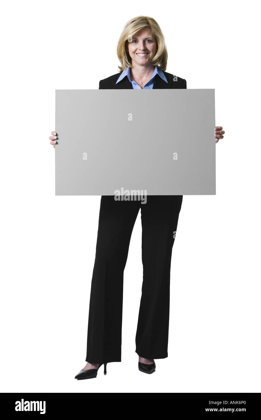 Porträt von eine Geschäftsfrau mit einem leeren Schild Stockfoto