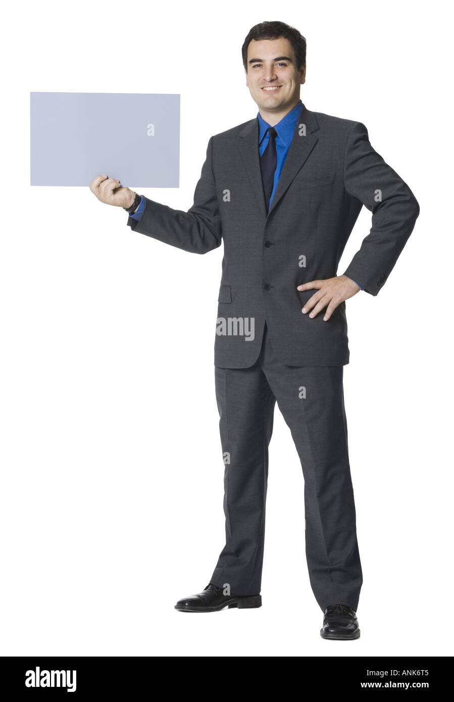 Geschäftsmann mit einem leeren Schild Stockfoto