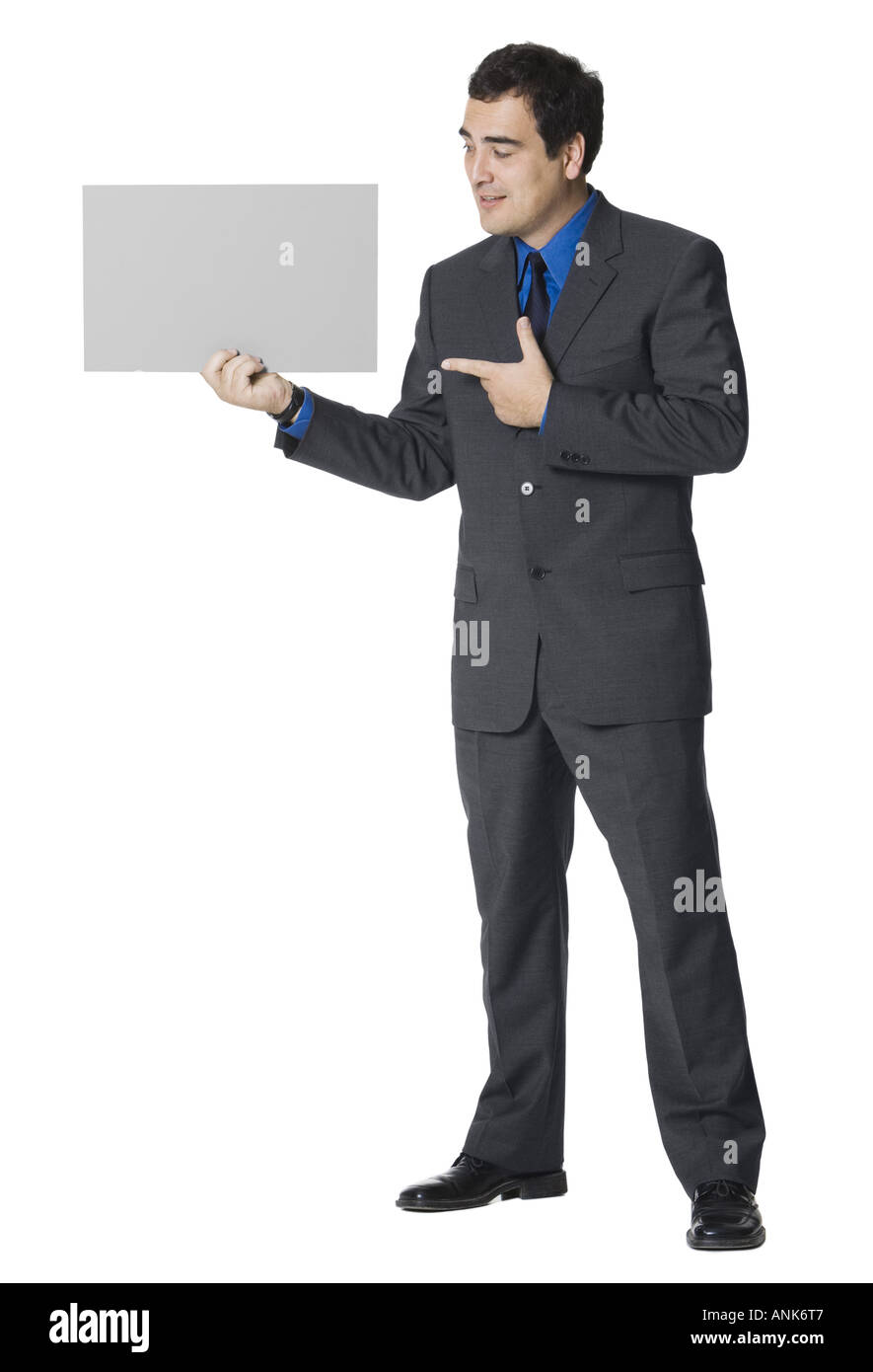Geschäftsmann mit einem leeren Schild Stockfoto