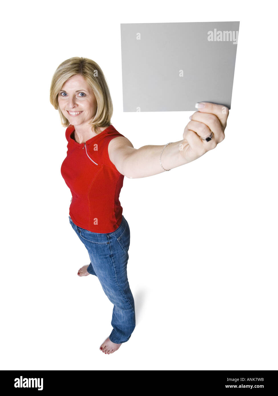 Erhöhte Ansicht einer Frau hält ein leeren Zeichen Stockfoto