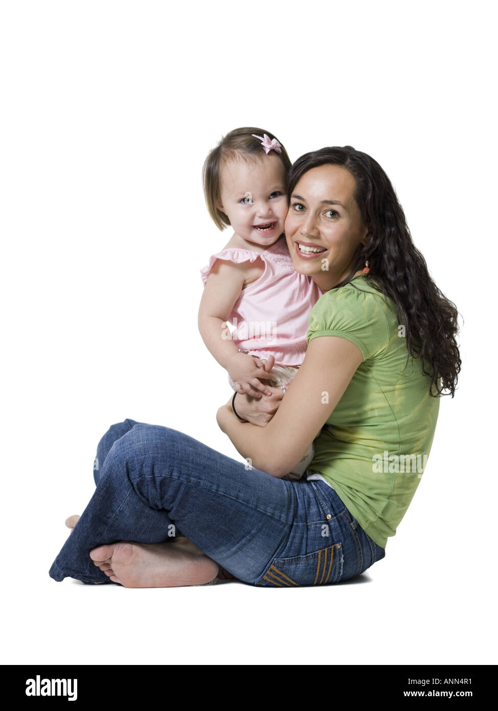 Porträt einer Frau, die ihre Tochter umarmt Stockfoto