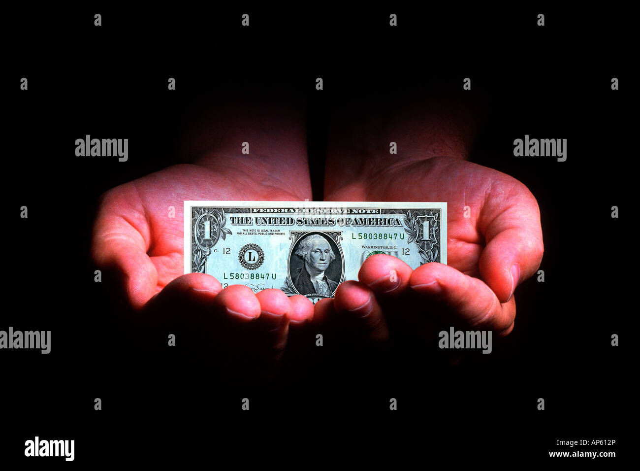 Zwei Hände mit einem Dollarschein, digital composite Stockfoto