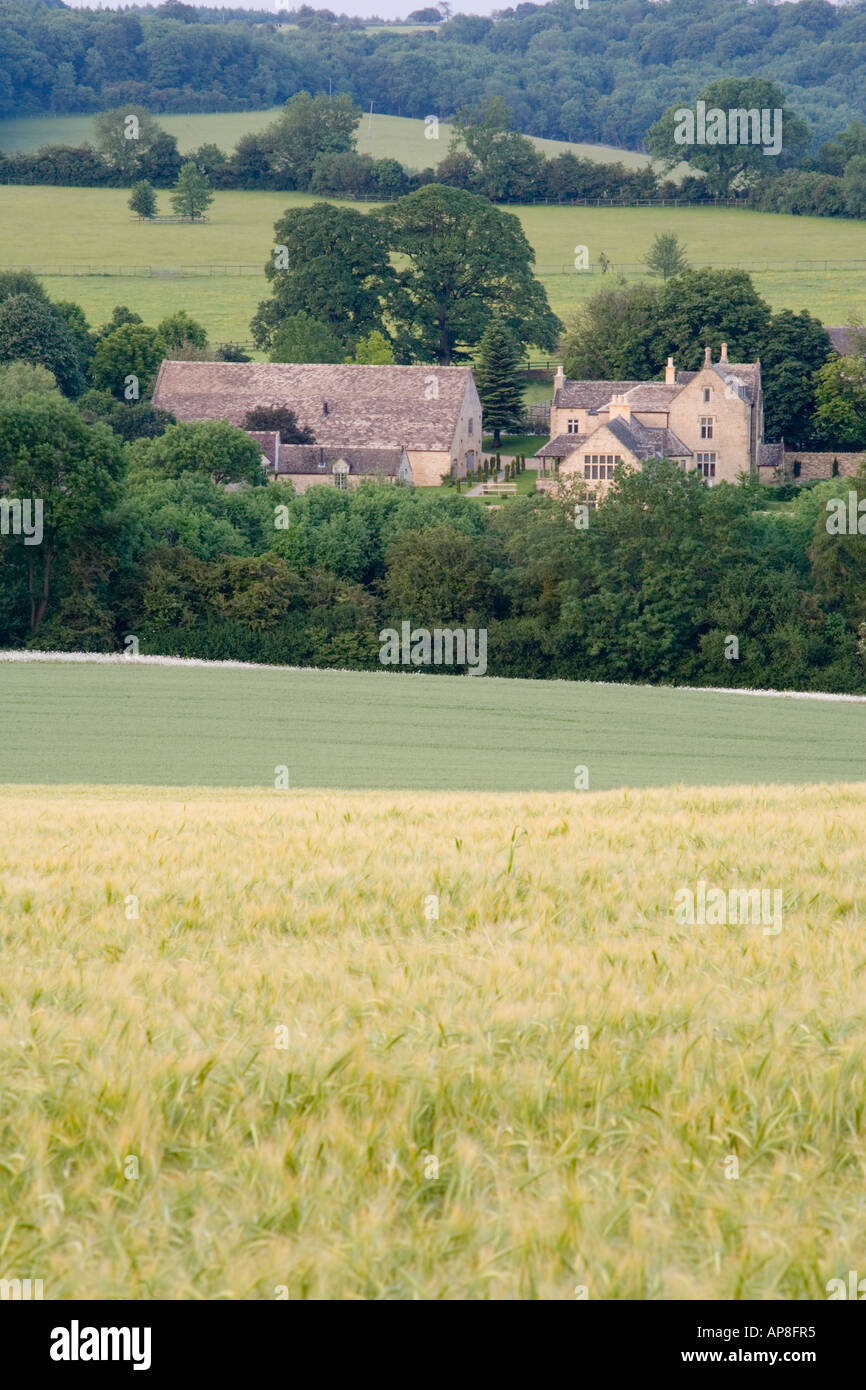 Am späten Abend Sonnenlicht fällt auf das Cotswold Gehöft der Castlett Farm in der Nähe von Guiting Power, Gloucestershire Stockfoto