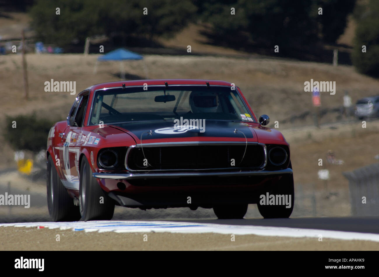 John McClintock Rennen ist 1969 Mustang Boss 302 auf der 33. Rolex Monterey Historic Automobil Rennen 2006 Stockfoto