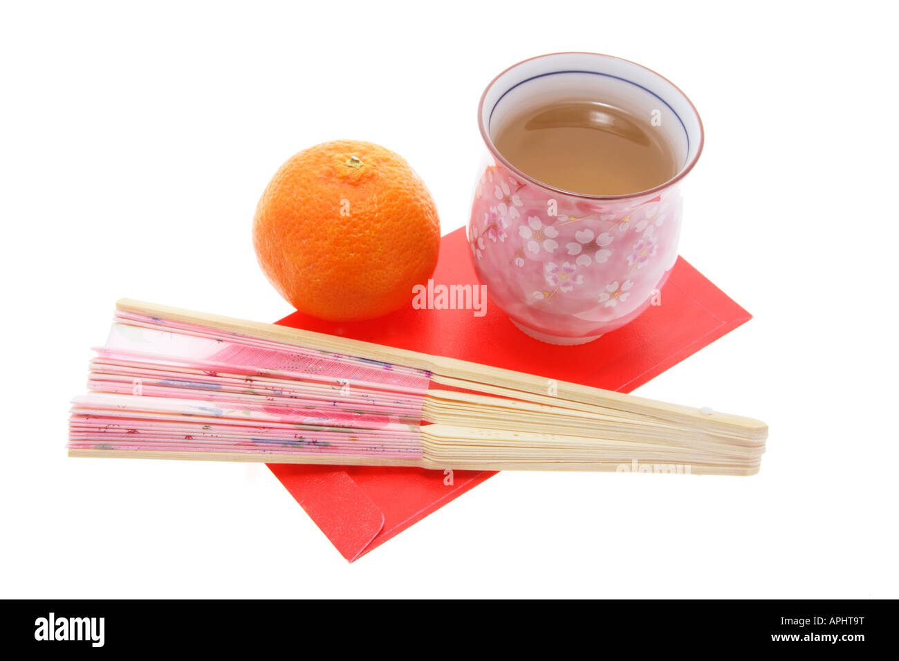 Chinesischer Tee mit Mandarine und chinesischen Fan Stockfoto