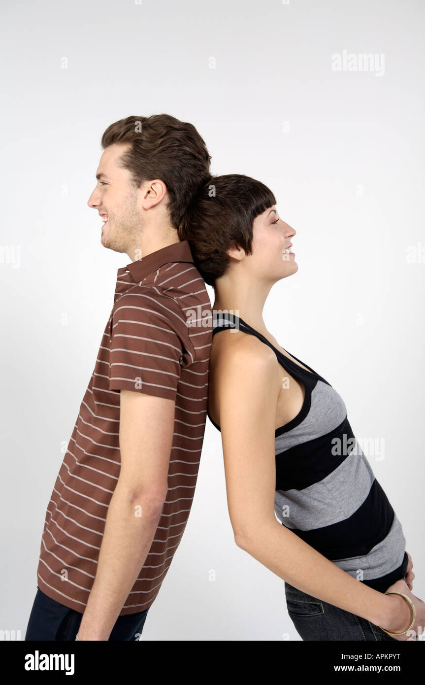 Paar Rücken an Rücken Stockfoto