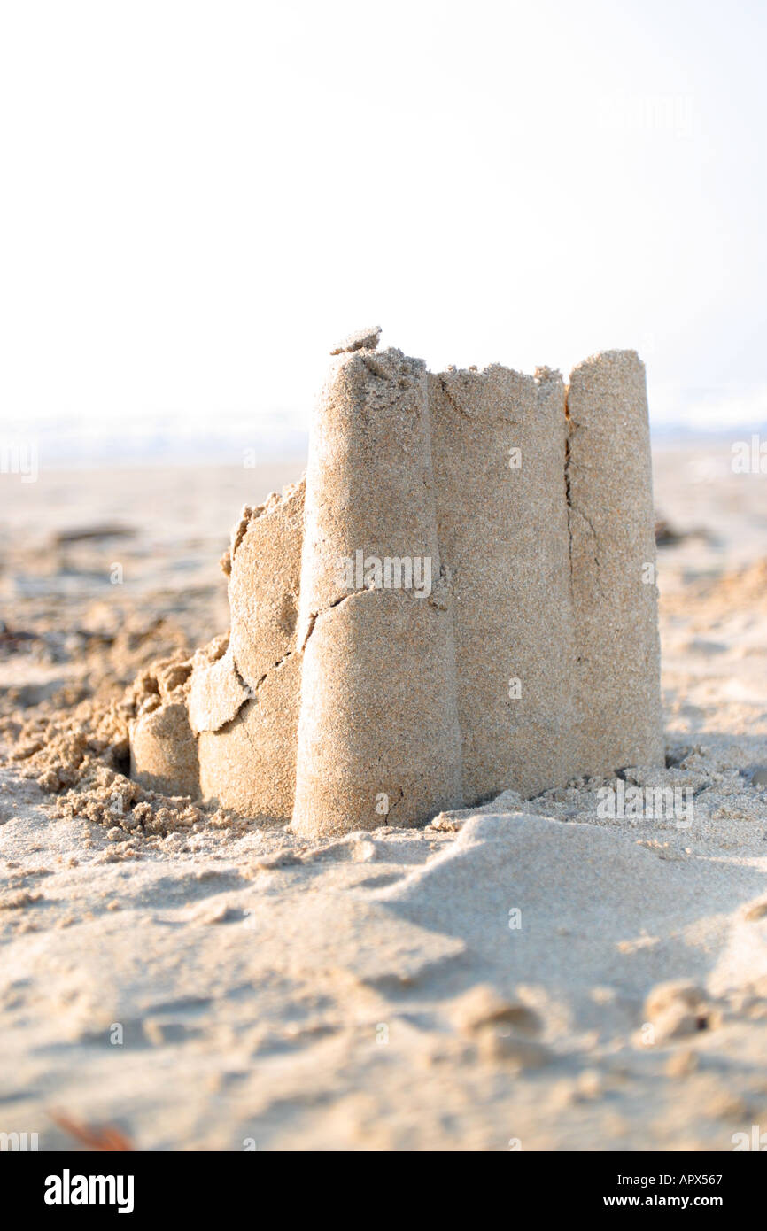 Sandcastle bröckelt Stockfoto