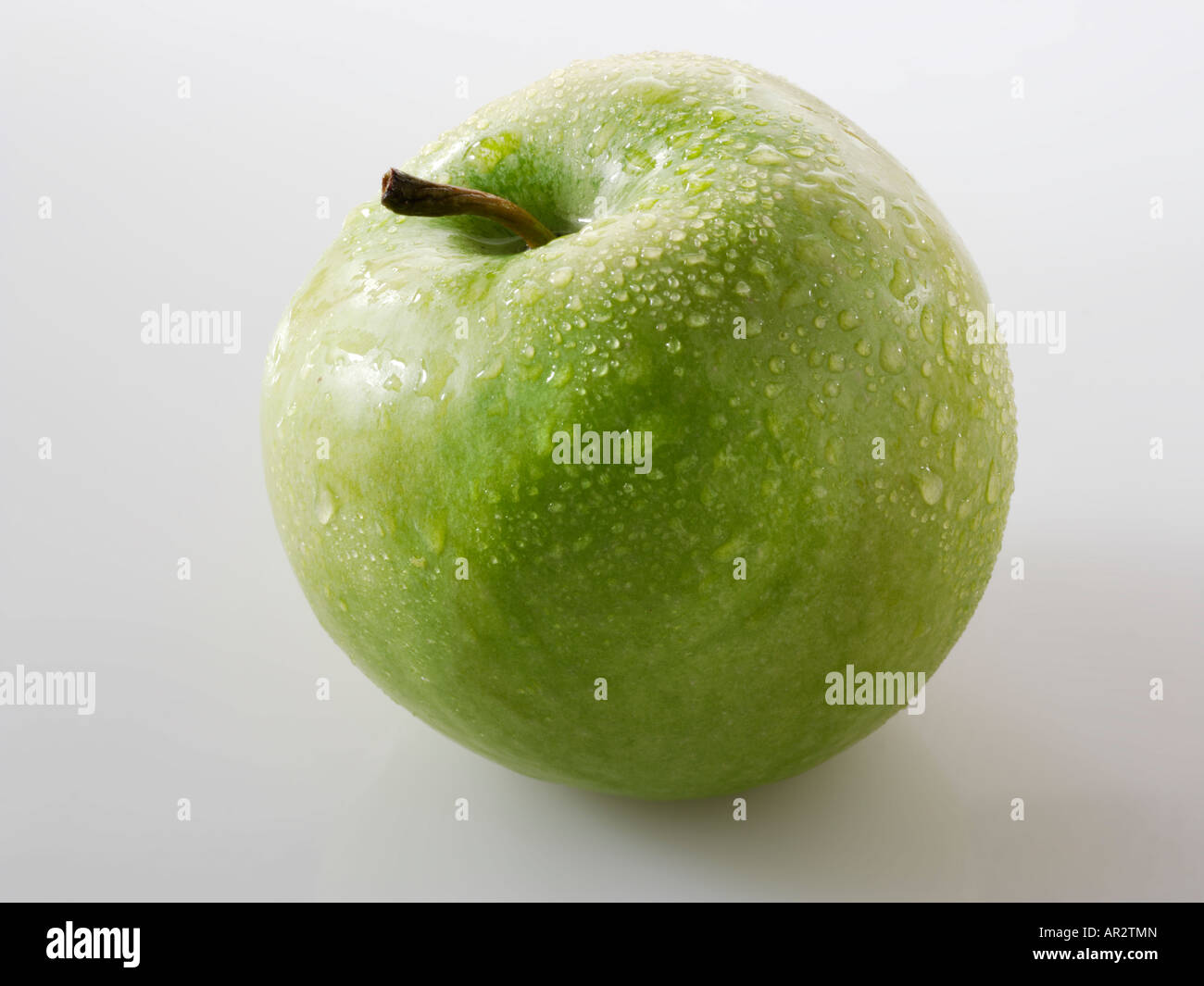 ungeschnitten grüner Apfel. Golden Delicious Stockfoto