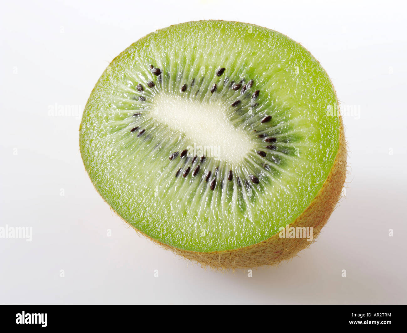 eine halbe Kiwifrucht. Schneiden Sie Stockfoto eine halbe Kiwifrucht. Schneiden Sie Stockfoto