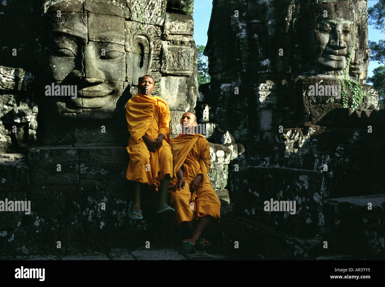 Mönche und Buddhas, Bayon Tempel, Angkor, Siem Raep Kambodscha Stockfoto