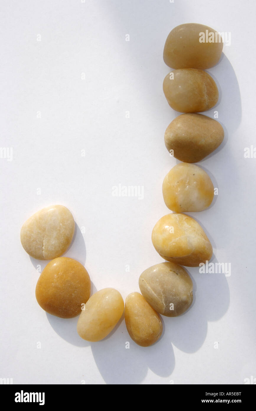 Stein-Alphabet-Buchstabe J Stockfoto