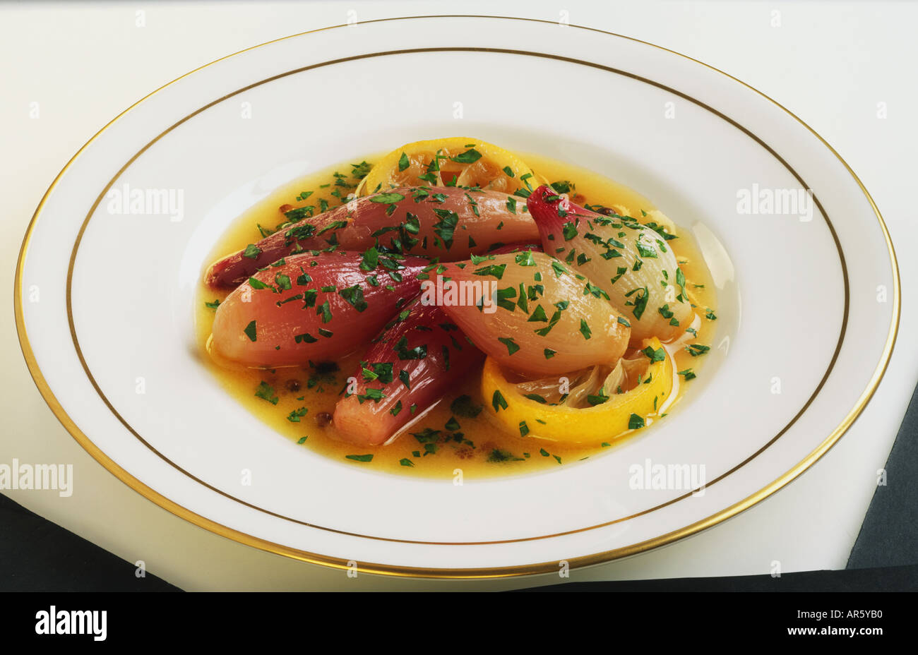 Zwiebeln à la grecque Stockfoto