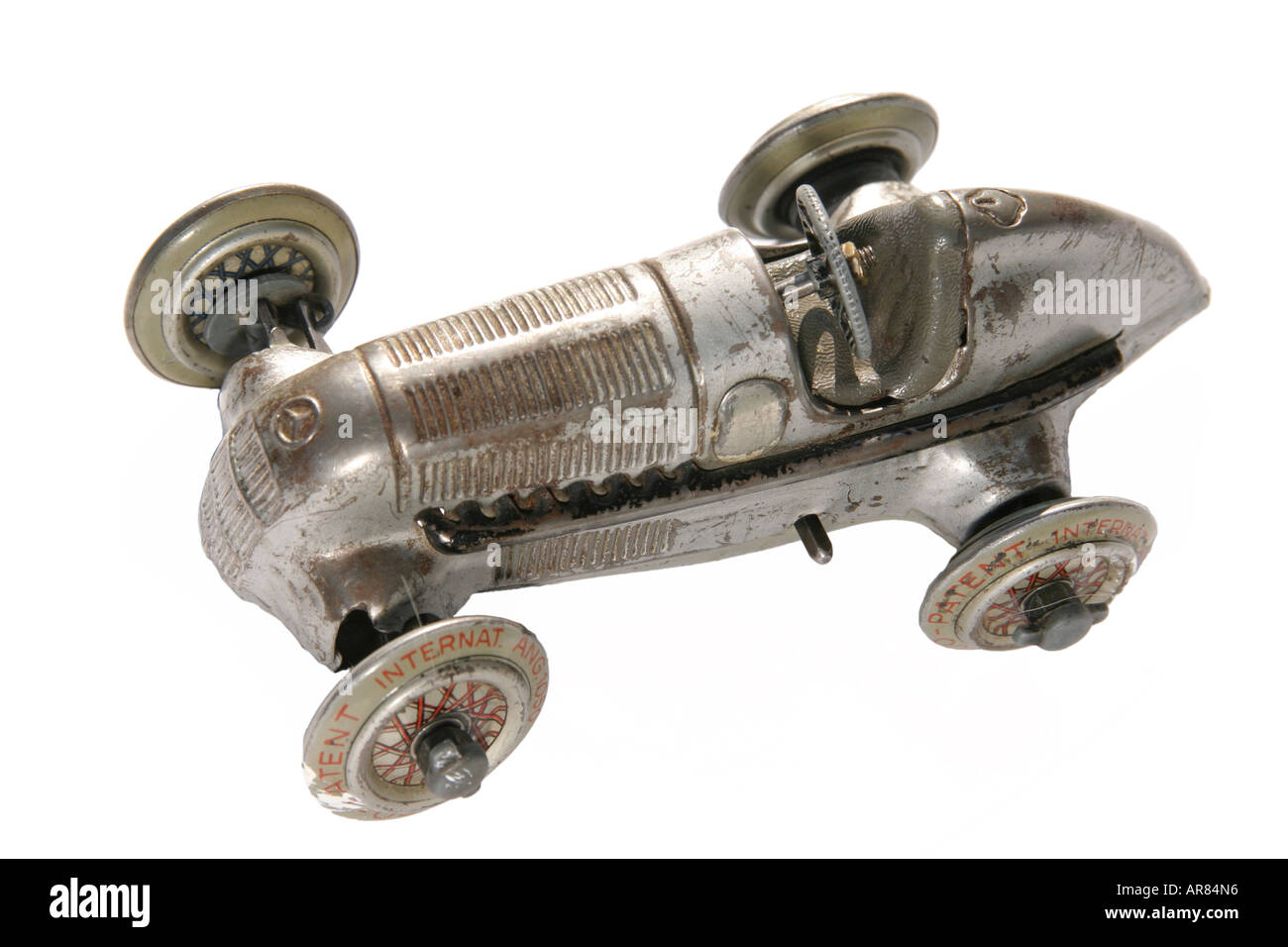 Altes Uhrwerk Blechspielzeug-Auto mit Schlüssel zum Aufziehen gemalt als  Feuerwehr-Fahrzeug Stockfotografie - Alamy