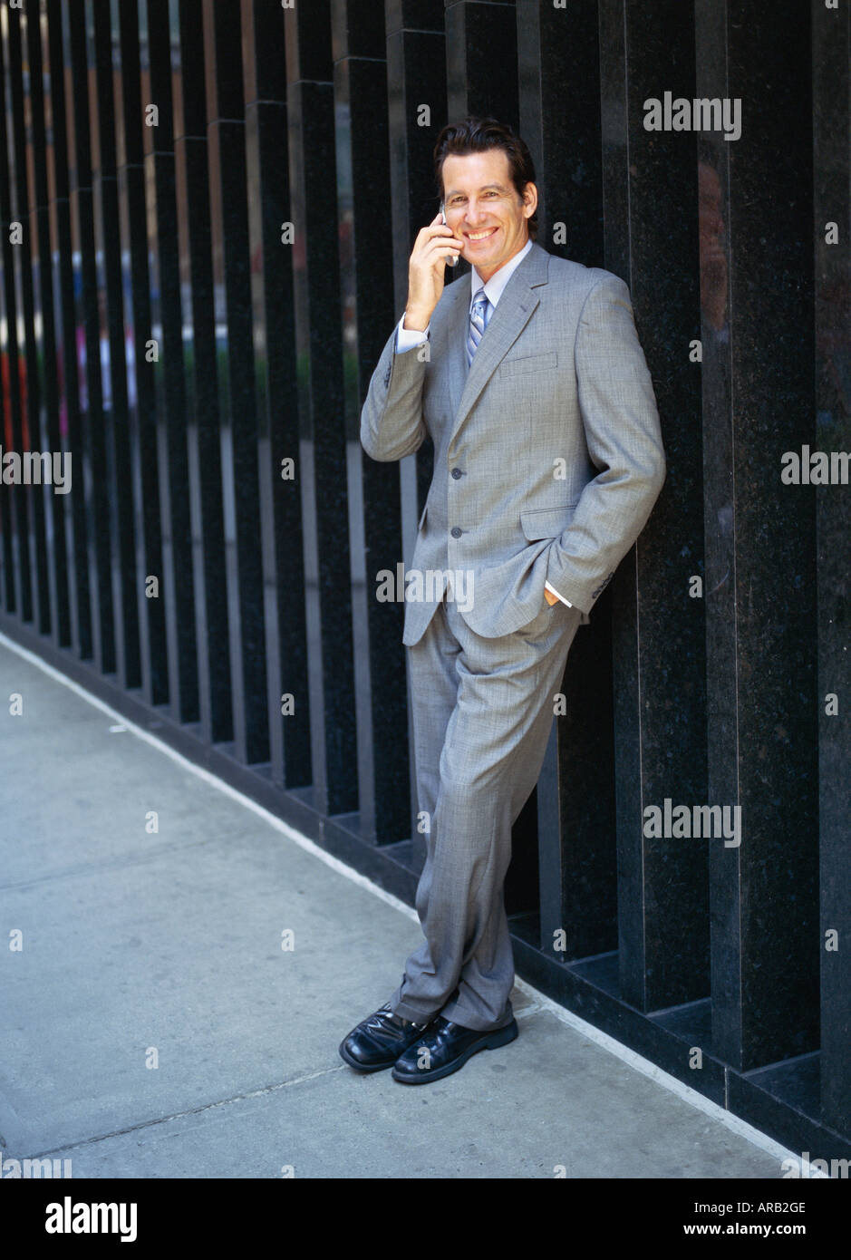 Geschäftsmann mit Handy Stockfoto