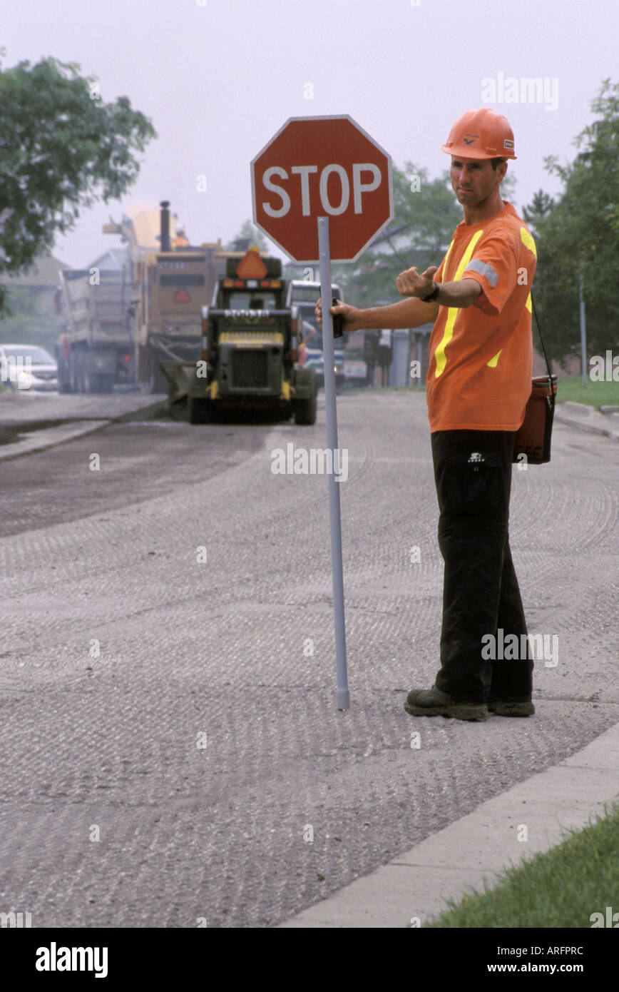 Flagman Oberflächenersatz Projekt gerichtete Kamera unterwegs Stockfoto