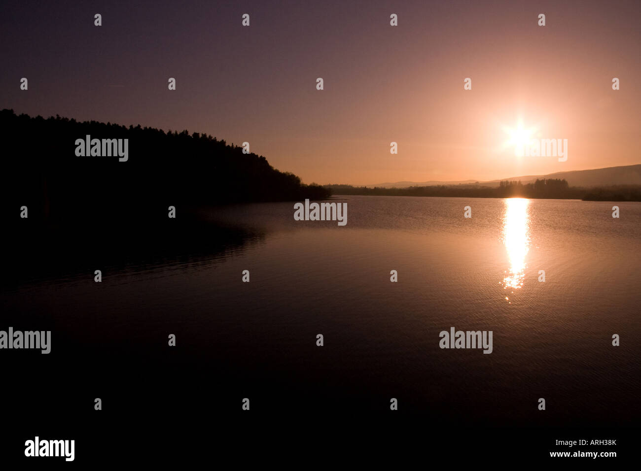 Sonnenuntergang über Vartry Reservoir Rundholz Co Wicklow Stockfoto