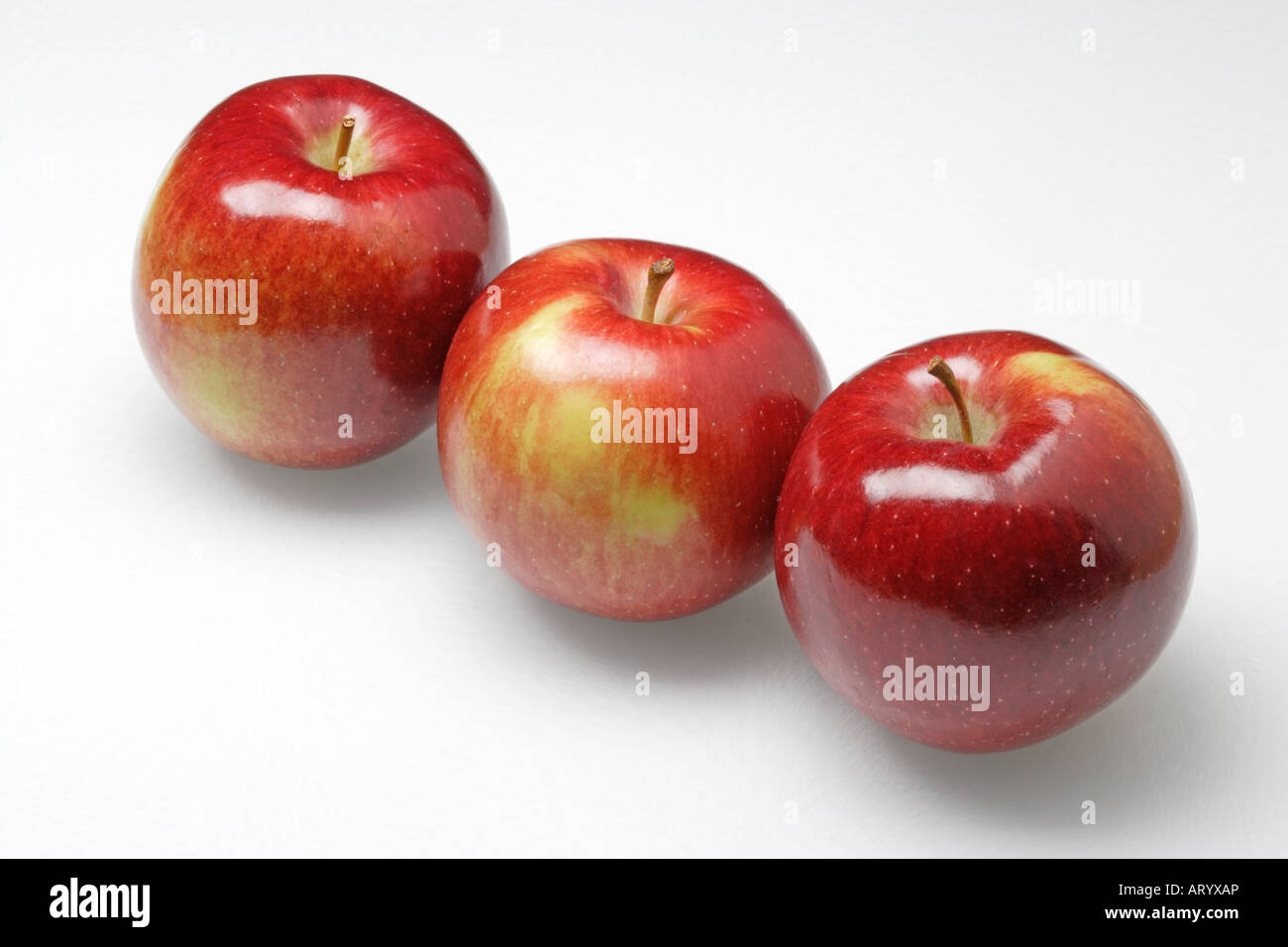 Drei rote Äpfel Stockfoto
