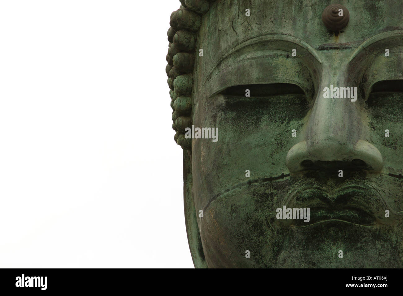 Eine Nahaufnahme Bild des Gesichts der große Buddha-Statue im Kotokuin-Tempel in Kamakura, Japan Stockfoto