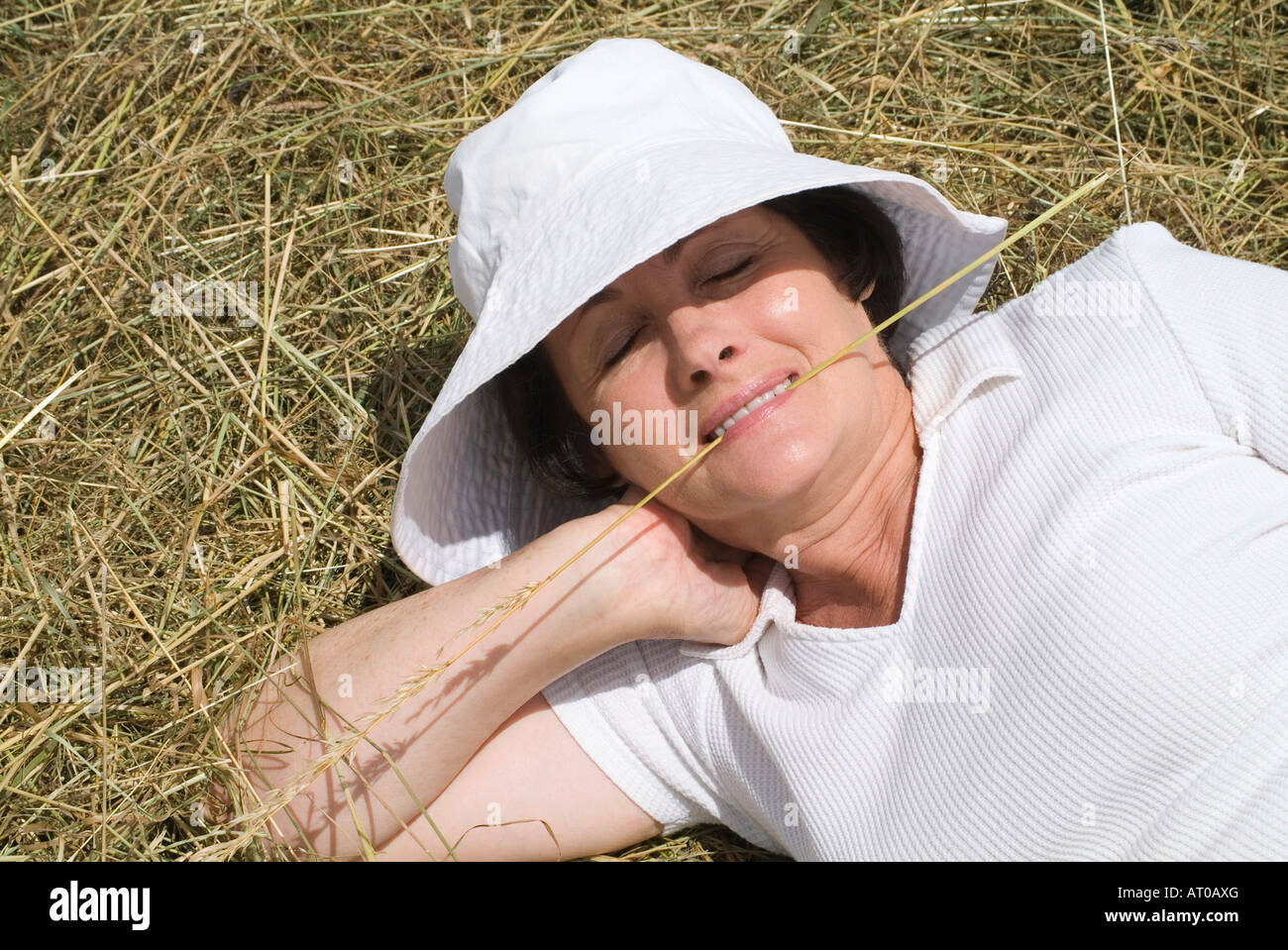 Frau mit Hut Stockfoto