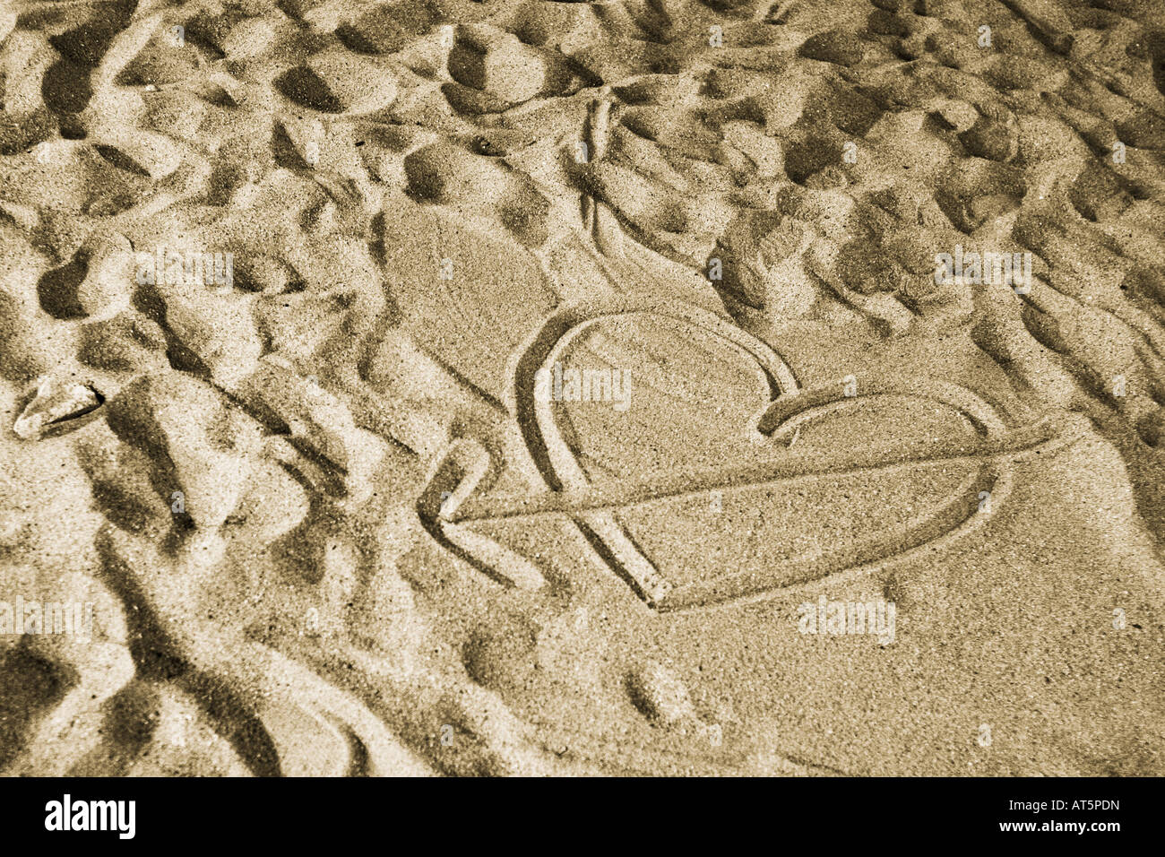 Liebe tut weh auf dem sand Stockfoto