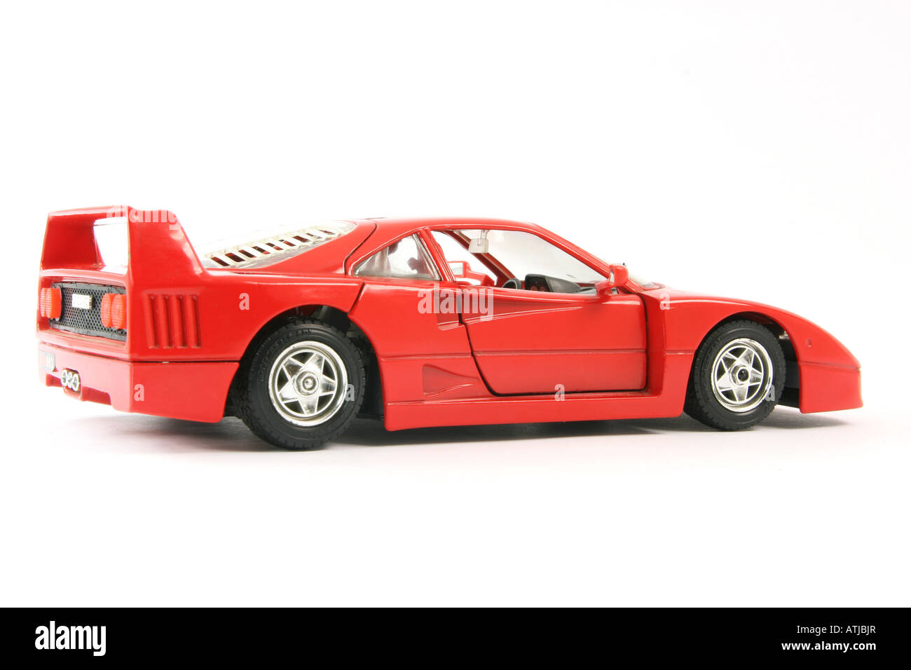 roter Sportwagen Miniatur isoliert auf weißem Hintergrund Stockfoto