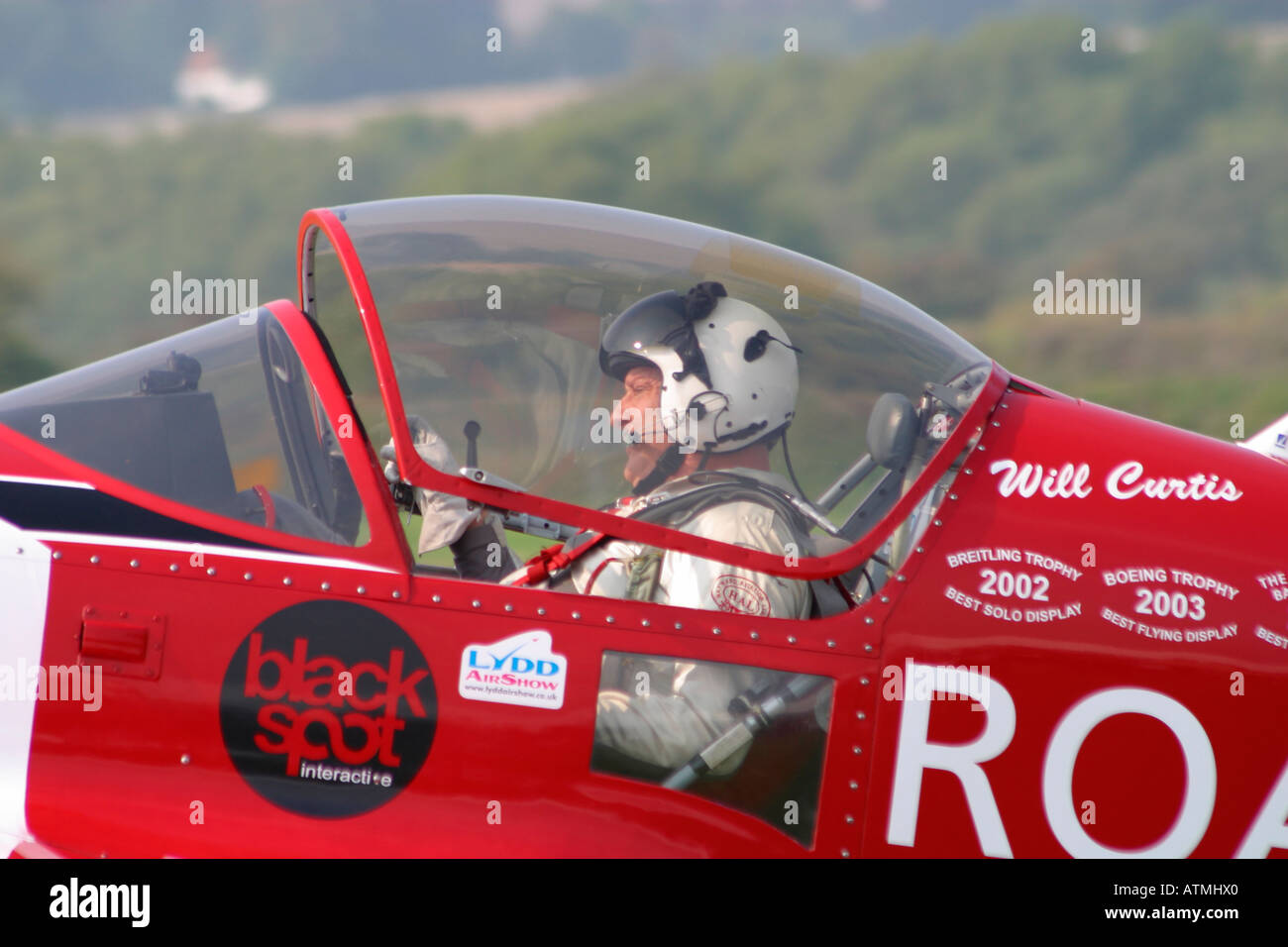 Pilot Will Curtis in seiner Sukhoi 26 M2 Stockfoto