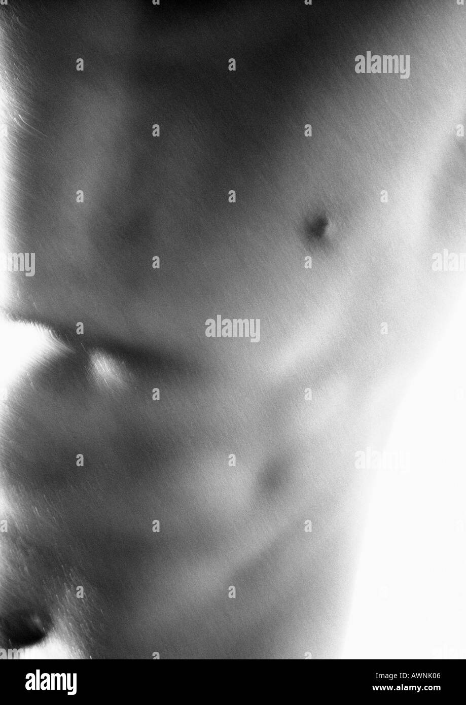 Mannes nackten Brust und Bauch, verschwommen, close-up, schwarz und weiß. Stockfoto