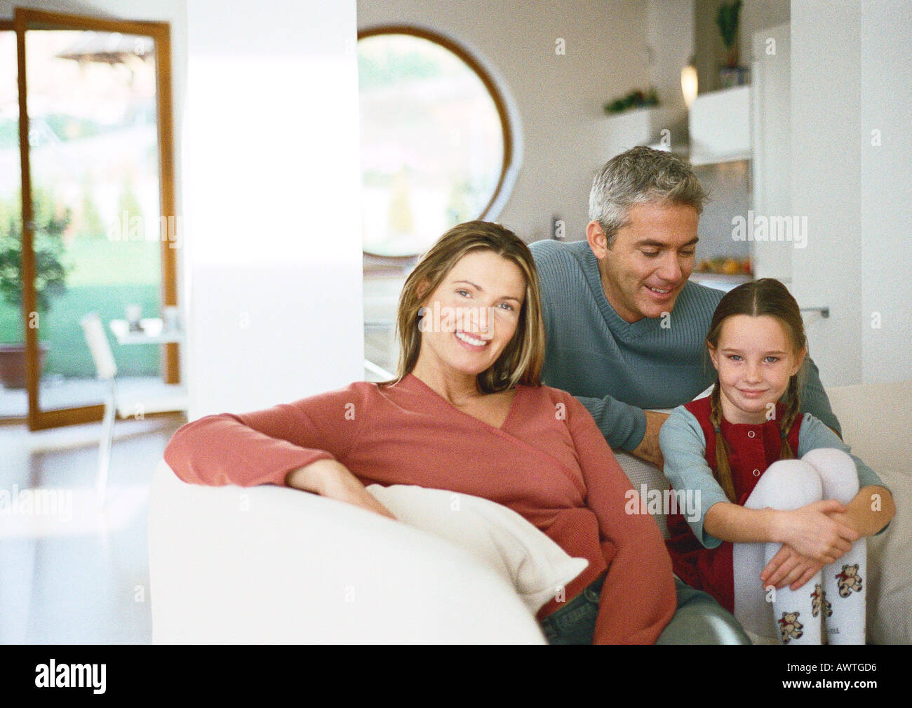 Familie sitzen zusammen, Porträt Stockfoto