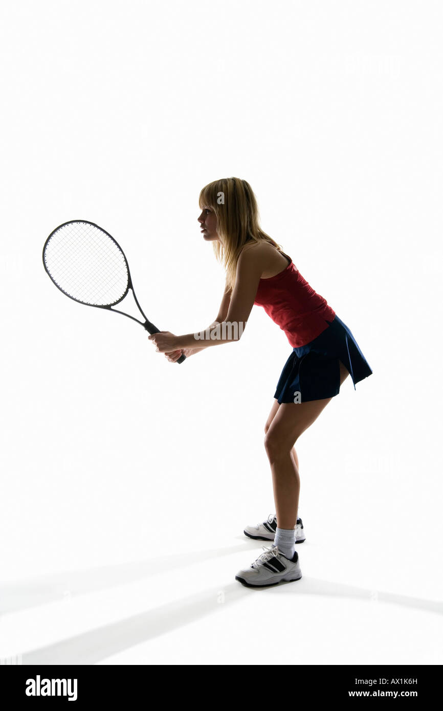 Studio-Porträt der eine hält einen Tennisschläger Tennisspielerin Stockfoto