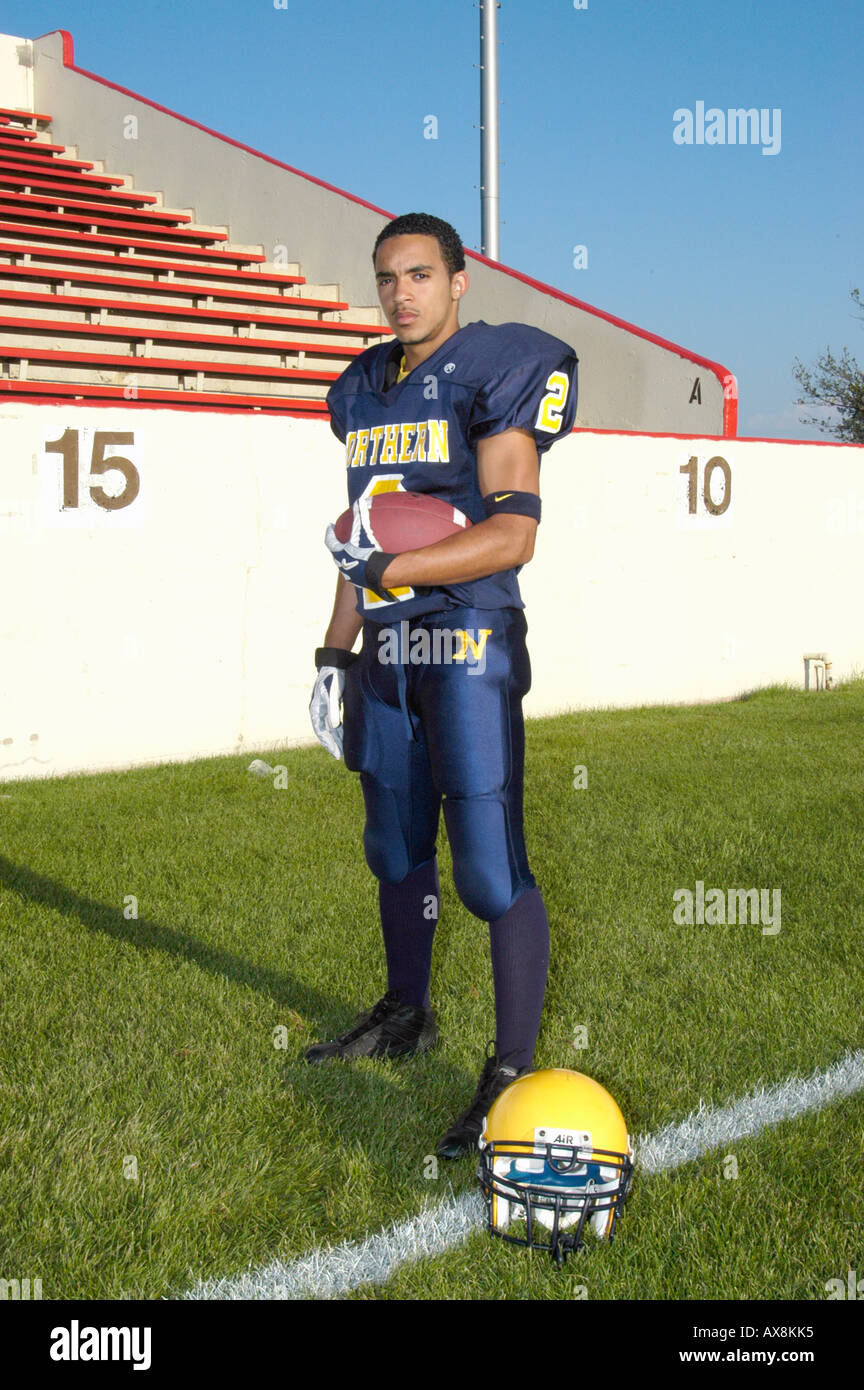 weibliche Highschool-Football-Spieler Stockfoto