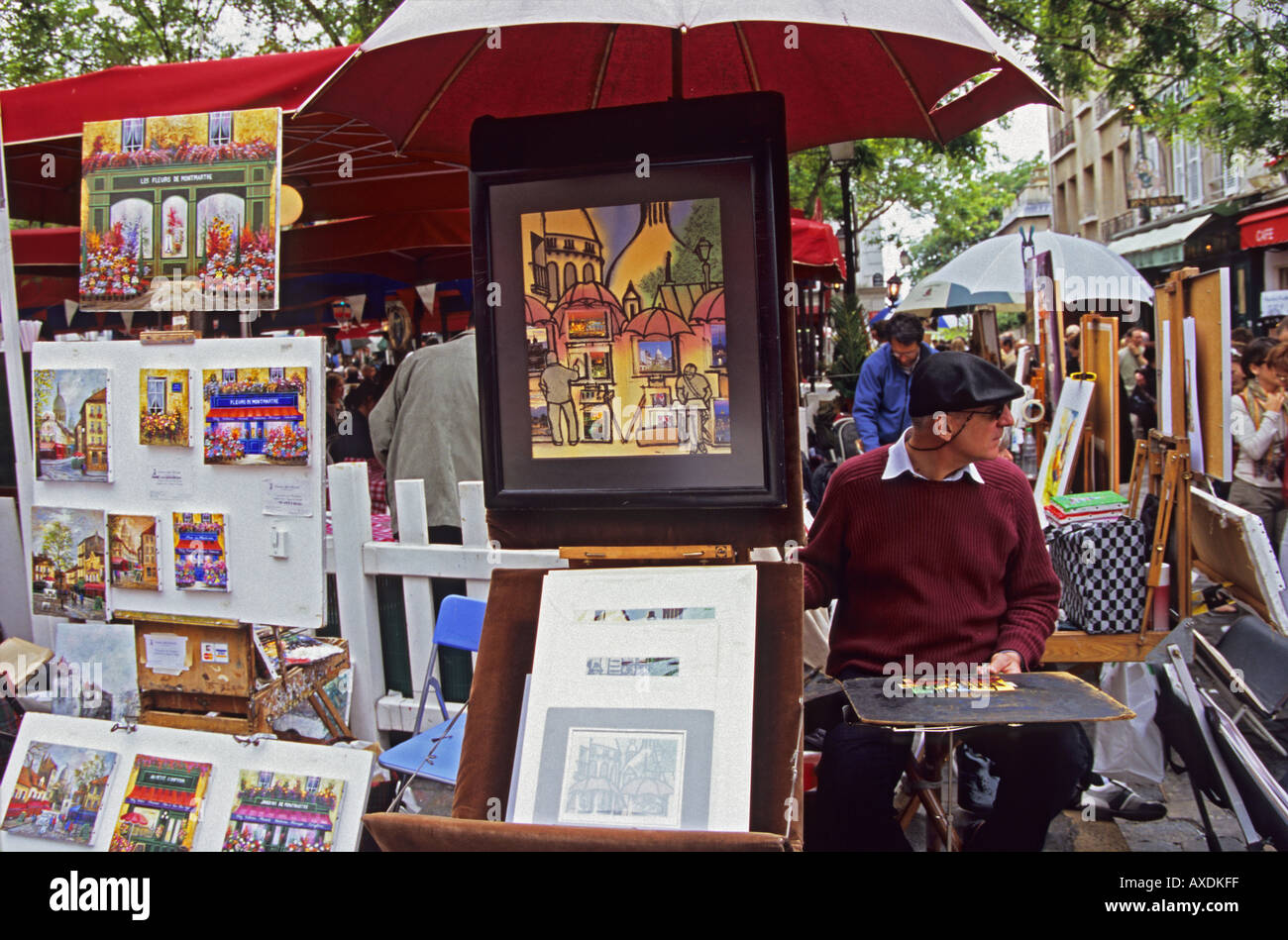 Maler und Gemälde zum Verkauf in die touristisch Place du Tertre in der Nähe von Sacre Coeur Paris Frankreich Stockfoto