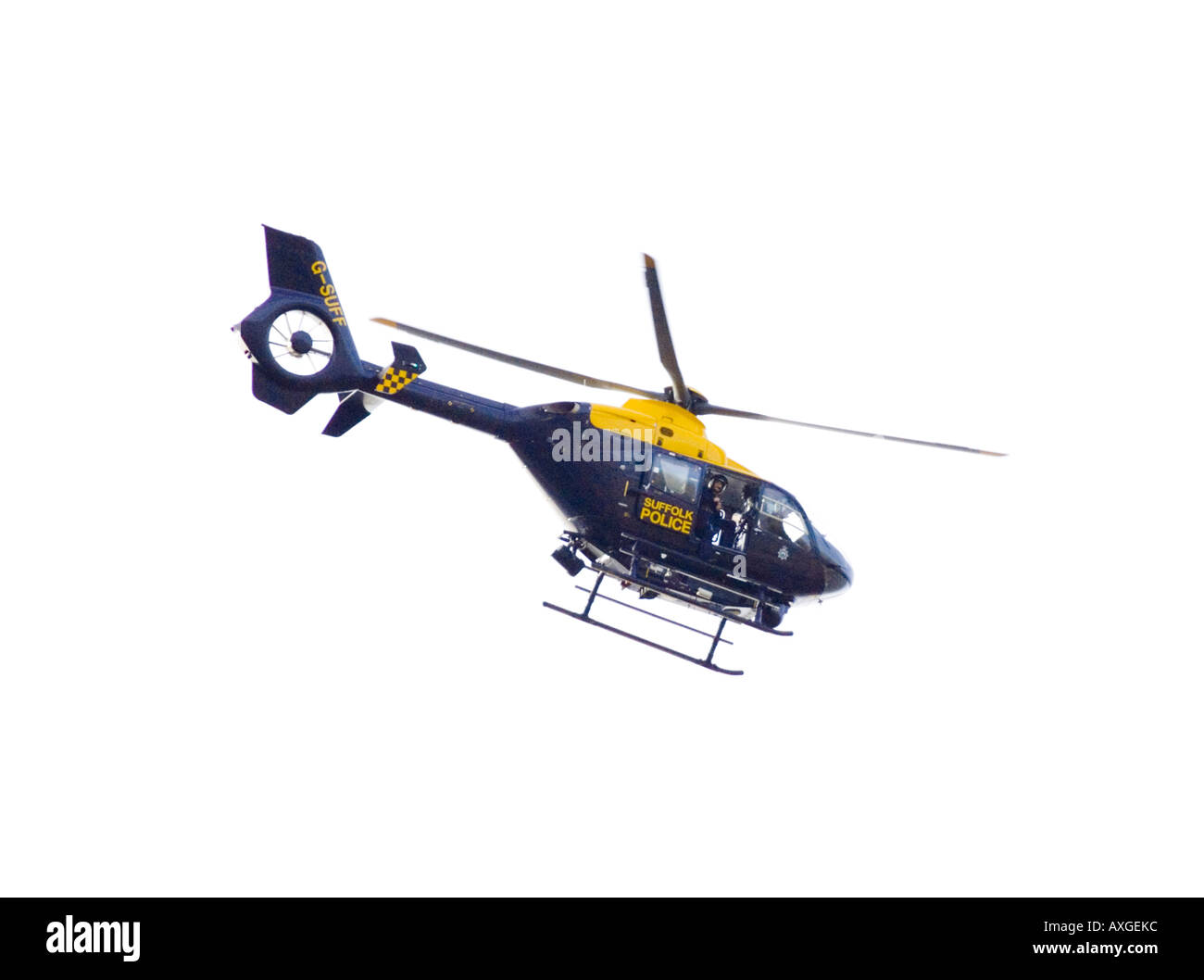 ein Polizei-Fotograf Fotografieren eines Raums von einem Polizei-Helicoptor in Suffolk Stockfoto
